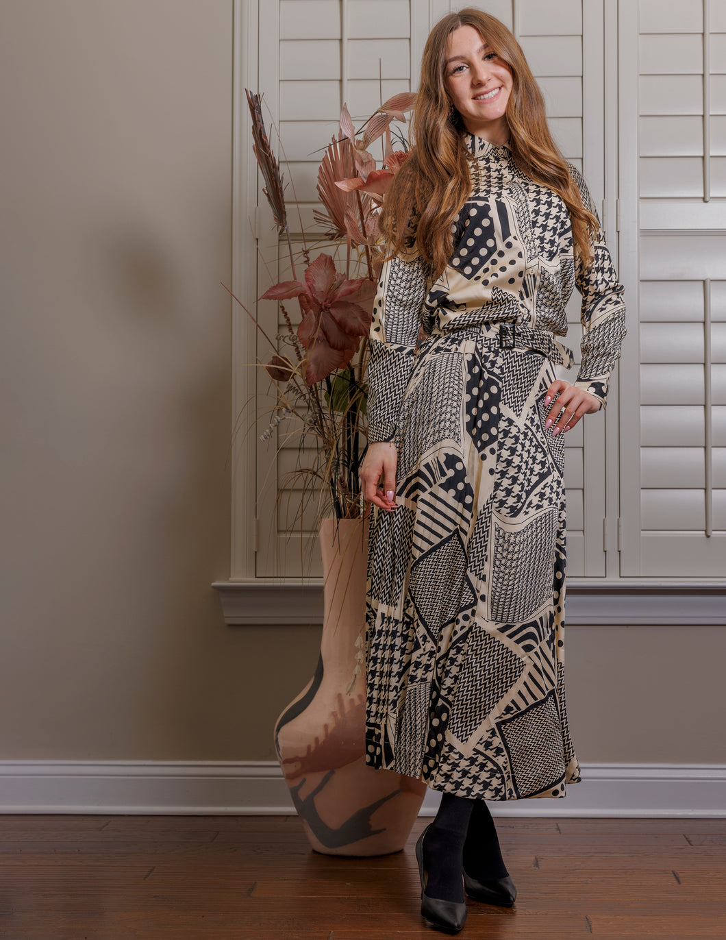 LI PLEATED AND BELTED FLAIRED JOINT PRINT SKIRT