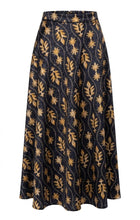 Load image into Gallery viewer, IV NAVY/GOLD PRINT SKIRT WITH VELVET TRIM
